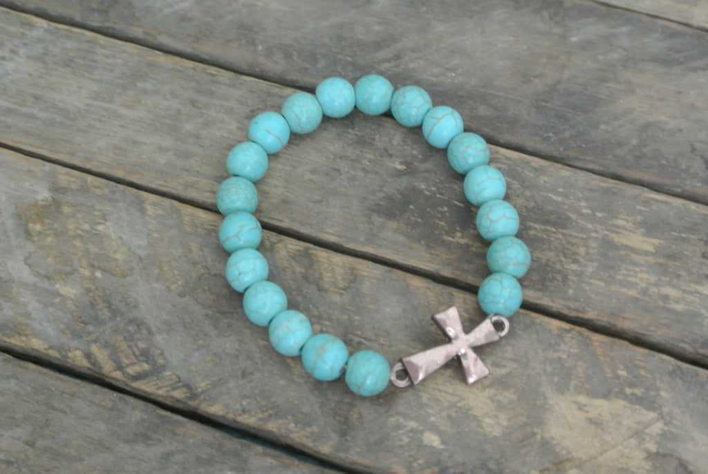 Turquoise beaded bracelet with Copper toned Hammered Cross Charm