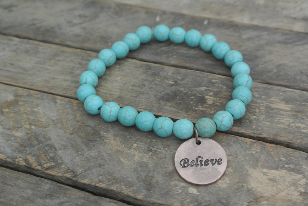 Turquoise beaded bracelet with Copper toned Believe Charm