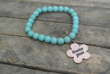 Turquoise beaded bracelet with Copper toned Practice Peace Charm