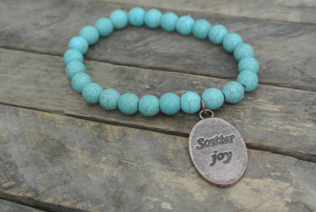 Turquoise beaded bracelet with Copper toned Scatter Joy Charm