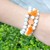 Orange and Ivory Cross Bracelets with Tassels